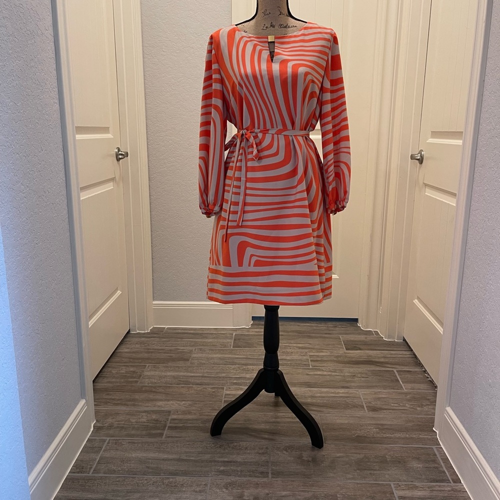 Orange and beige mid length dress, polyester material with lining.  Worn once!